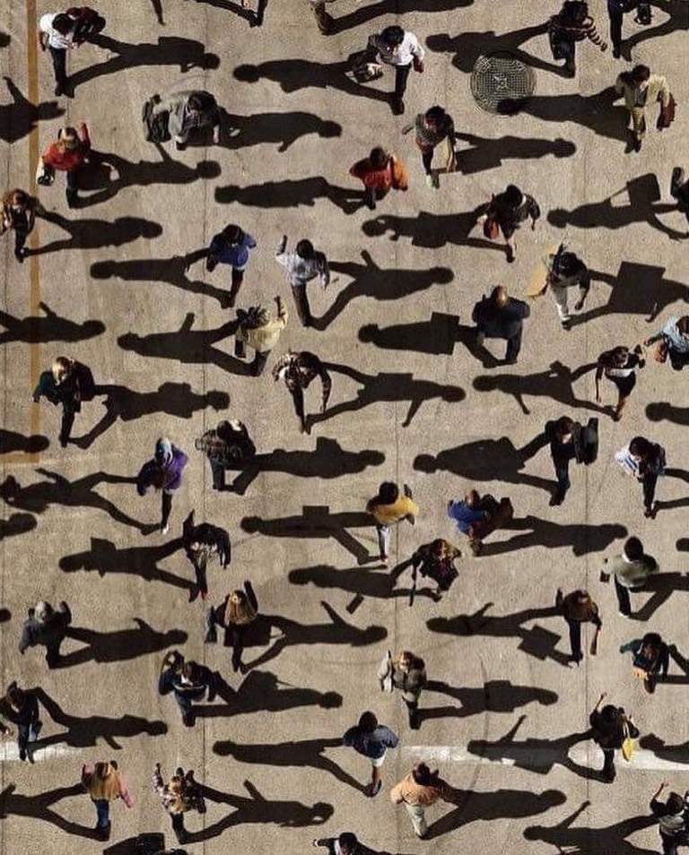 Huge crowd and its shadows